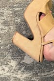 The part of the shoe that connects with the heel broke within a few hours of wearing it. - Sarah L.