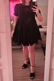 This dress is adorable. The one thing I didn't realize is that the bottom of the sleeve has an elastic band to create the scrunched look. It feels a little funny there but not too annoying. Otherwise, the dress is super comfortable. My recommendation is if you're not busty, you should size down. I'm usually a L and ordered M. The only part that's semi-form-fitting is the shoulders and bust area. Also, when standing it was definitely long enough for me but when I sit, whatever I'm wearing under the dress is what's touching my seat. Which is understandable with a baby doll dress. Super super cute! I can see it fitting for many occasions. - Miranda G.