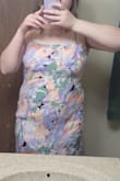 Zips just fine but not flattering at all unless you have a flat tummy and a small frame. Love the color and pattern though for spring! - Morgan D.