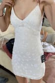 Great little white evening dress for a warm night out. Fit well. Its a little more sheer than expected, so a nude body shaper undergarment is needed. The length is shorter than we wanted, wish it was an inch or two longer especially in the back but it still work. Fun & pretty. - Loree H.