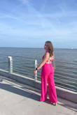 I am not someone who wears pink, but it was required for a bachelorette party, so I committed, and I am glad I did! This outfit was a hit! I will always opt for pants over a dress and I still felt confident and sexy in this outfit. I did get about 2-3" hemmed off the pants, but besides that it fit perfectly. I normally order smalls but after reading reviews ordered an XS and I'm glad I did. The only thing that I didn't love were the side seams in the top, it didn't allow the top to lay flat, but I am sure this differs by chest size. - Becky M.