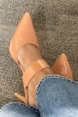 The heel height on these shoes are perfect and they are almost the perfect nude for us medium toned/brown skin girls! Especially if you have red/orange undertones. I'm not sure why some other reviews from more fair skin customers mention them not really being nude when the description clearly says Tan, but they're exactly what I was looking for. They're not noticeably comfortable, but they are by no means uncomfortable. I wore them comfortably at work all day. I do wish the heel was a tiny bit bigger as I managed to somehow get the heel caught in the crack of the sidewalk, but that's on me. It's so hard to find my shade of nude shoes that I'm considering buying another pair as a back-up for when these get worn out. Buy these shoes! :) - Annissia C.