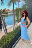 The fabric on this dress is amazing. It's such a classic look with a bit of sexiness. The blue is robin egg blue, it's beautiful. - Sharie I.