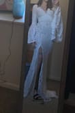 I bought this dress hoping to wear it to my wedding. I got a size SMALL and it fits perfectly. Obviously it needs some alteration because my chest is on the small side so it's a little loose but other than that everything is perfect. - Elle J.