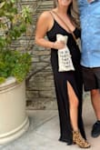 I love this jumpsuit!! I wore this for a wine tasting weekend a year ago and again at my baby shower while 31 weeks pregnant. Stretchy material that will flatter you no matter how your body changes. Love the slits too! - Erica S.
