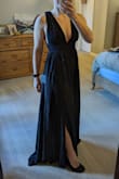 I originally ordered a small and the dress was very long (even with heels) and the shoulders were incredibly loose. I exchanged it for an xsmall and again, same problem... Felt like the only thing that was smaller between the 2 sizes was it was tighter around the waist. It is a beautiful, flattering and comfortable dress so I'm going to keep it and try to find someone to alter it. Wish there was a petite size offering as I feel like I'm an average size so others probably have this issue... - Jacquelynn R.