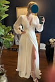 Purchased this for a very small courthouse wedding, and I am absolutely in love with it. I wear a small, but I'm fairly busty (DDs), and the fit is very elegant. I did need to get it hemmed about 3 inches, it was super long (the picture is before it was hemmed.) The fabric and structure of the dress feels very high quality, it's a great value! - Taylor M.