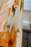 The dress is beautiful and I bought it for my upcoming honeymoon in Cabo. It's almost perfect but I can't give it 5 stars because I just found a hole in it. You can see my finger nail sticking through it in the first photo. This is the first dress from lulus that I've had a problem with. I leave for my honeymoon on April 24, 2023 and this dress was on sale so I doubt I can return it and receive a new one before I leave. I am disappointed to find a hole in it, other than that I love the dress. - Nicole P.