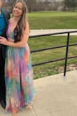 I am just under 5'6" and has 4" heels and it was still long on me. Short girl problems! - Briana B.