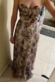 Very beautiful, formal dress I bought to wear as a guest to a wedding. It's very long which works great for me since I'm 5 ft 10in but anyone else will probably need it hemmed. The lace up corset top is so pretty and flattering. - Danielle F.