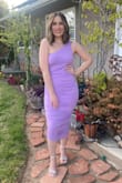 I wore this dress for my birthday and felt so beautiful. It fits perfectly, and I love how the ruched material hides what I still have of my postpartum tummy. I also love the lavender color. So perfect for Springtime events! And super comfortable too. - Casey C.