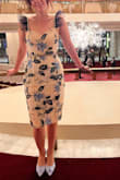 This dress is more stunning in person. It has beautiful detailing that pictures do not do justice. There is not a lot of give, so if you are in between sizes, choose a larger size and have it tailored. I wore this to an opera at The Met in NYC and received a few compliments from strangers. - Samantha W.
