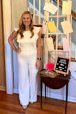 This jumpsuit runs long. Unless you plan to wear high heels, you may need to get it hemmed so it doesn't drag on the floor. Very comfortable! I received LOTS of compliments on this jumpsuit. It's low enough in the back though that I couldn't wear a regular strapless bra. You'll need a low-back bra OR a backless bra. You might be able to get away with no bra. - Tara C.