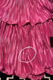 Obsessed with this romper. I bought it for a Taylor Swift concert. Super comfortable and fun. My only complaint is that the front seam doesn't lay flat and causes some bunching of the shorts. I returned it and bought another, and the replacement romper had the same issue. It's not a huge deal, but I wish it would flatten out so the pleats will lay down straight. That is the only reason I didn't give it 5 stars. - Shelby N.