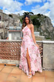The most beautiful and flattering floral dress I've ever owned. The quality is amazing too and I can't wait to wear it again. I will say I'm a little taller and the length was perfect for me with heels, so it might be a little long for someone who is shorter. Overall I love it! - Daniella C.