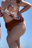It was super comfortable and felt good on my body. I played in the ocean with it and the top didn't really stay on well. - Ari G.