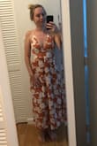 Love this! Went a size down based on other reviews. I'm usually a size small in everything Lulus, but went with an xsmall. I'm smaller in chest than hips, so it fits perfectly. The waist is stretchy in back also. Flowy, comfortable, and love the slits on both sides. Can't wait to wear it out! - Ashton Y.