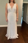 This dress is AMAZING. The quality for the price is just insane. It fits perfectly, isn't heavy, and the straps or so comfortable. It fits perfectly. I am wearing this for my elopement party dress and I could not be happier. - Taylor H.
