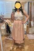 The skirt is super cute and the material is super nice. It just creases really easily but can easily be dressed up or down~! Please excuse the fact I took the skirt out of the bag 2 minutes before taking the picture XD it will likely need a steam before wearing~! (My waist is 31" for reference~!) - Lexie J.