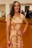 I really love this dress! .  When I got it I was concerned it was too short, but it looked great.  I received so many compliments! I wore this to my cousins wedding & felt very confident.  If you're considering ordering this dress, do it! You will feel so pretty in it. The only negative Is that it seems easy to snag & some of the beads aren't very secure, but it's nice quality overall. - Niki L.