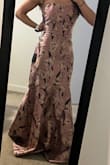 This dress is super cute and flattering and the fabric is very nice. NO stretch so you may need it altered and it's a bit long for me even with heels but I love it! - Alyssa H.