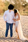 I wore this for my engagement pictures and it was perfect!! Fits true to size and wouldn't have sized up. - Paris T.