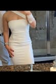 Honestly, this is a beautiful dress it's classy and timeless. I love how the dress fits and the asymmetrical strap across the chest. It is a unique dress. I also love how white and bright the dress is. - Gabrielle M.