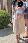 Actually quite beautiful. Received a lot of compliments. Also, a perfect dress if you need to breastfeed. - Amada S.