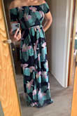 I love the way this dress fits me. I've struggled to find something not too form fitting as I still have weight to lose after having my baby. This dress makes me feel great and the pattern is super cute. The dress is pretty long on me but if I wear heels it is fine. - Nicole A.