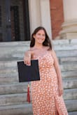 This dress was perfect for my college graduation. It was a good length and wasn't too loose or tight, especially around my stomach. It also has adjustable straps. - Alana L.