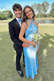 Beautiful and elegant dress. The color was beautiful on my daughter as well. - De'Anne M.