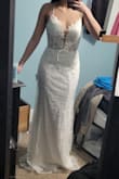 The outside fabric was a little rough for texture but it was very comfortable and just stunning! If you think it's a lot of skin in the front it is not. It covers beautifly. The back is a bit low but I can always adjust it. It's comfortable, it's sexy, and perfect for ny wedding reception! - Aimee H.