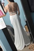 I loved everything about it. It was so comfortable and really advertised my hips. I have 0 complaints about it. The train is long but beautifully soft and well made. If you think you might not like it as much as some other dresses, GET IT. You won't be disappointed!! - Aimee H.