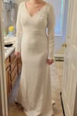 The dress fits so well! All it needs is a minor adjustment in the bust. The stretchy material and construction create a great silhouette. The material is heavy which is perfect for my outdoor event in the mountains in the autumn. - Taylor C.