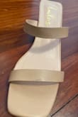 Love the height of the heel and the color. The straps ran a bit large on my foot. The only thing I didn't like was that the material had some sort of scrape mark on them when they arrived. - Vanessa G.