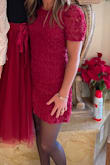 I wore this for Christmas- I am 5'4 and it is maybe a little short, but it didn't bother me. Looked good with black stockings - Caroline M.