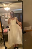 I ordered this dress for my engagement photos and was so excited. This dress was not the quality I was expecting based on the price. The material is super stretchy so I would size down and don't except this dress to give you much shape it does not cinch you in. The second time I tried the dress on (after exchanging for a smaller size) the elastic in the right strap broke and we had to makeshift a way to keep the sleeves on for my pictures. Overall I am disappointed in the quality - Emma L.