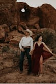 I bought this dress to take pictures with my husband. Fits beautifully except if you're on the short side like me you will need to have it altered. Love this dress! - Sara N.