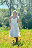 I wore this dress for a random "engagement" photo session in the bluebonnet fields. I think it's a perfect summer dress. Would look great with sandals, and wedges, dressed up with a denim jacket, or just how it is. It's a little smaller in the bust area but wasn't any sort of issue for me. - Elise S.