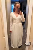 I love the style of this dress. But if you have a small torso and larger hips like me, it would probably need alterations to fit properly. The top was baggy in the front and back, and I wasn't really a fan of how loose the sleeves were. I don't think it was an issue with the size I got, because the waist fit snug. Not a bad dress, just didn't love it the way I loved the pictures on the website. - Helena W.