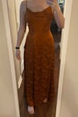 Reminded me of a Thanksgiving tablecloth. Such a flattering fit though, if you want a slit it's super hidden so def doesn't sit like the pictures of the model. - Dorothy-Faye S.