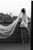 Obsessed with this. I bought for my boudoir photo shoot and as my getting ready robe for my wedding. It was perfect for both. I am 6'1 with an athletic (long, broad and lean) build and ordered a medium. Highly recommend. - Kelly H.