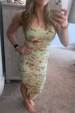 If between sizes - go down! Medium was sold out so I ordered a small and crossed my fingers. It's fitted but not uncomfortable! Perfect amount of stretch to this dress that makes it so comfortable! - Laura D.
