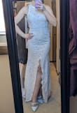 This dress is absolutely gorgeous. Like so many others, I wasn't sure what to expect for the price - but wow! The material, the fit, just what I was wishing for my elopement. One note on sizing, I am smaller chested and while I do feel that it is true to size, I was expecting to have the top feel looser. So, if you have a bigger bust, you may want to size up and have it altered for the best fit! Picture is not great quality, but taken in natural light. - Kate B.