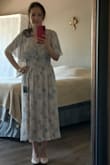 I'm so happy with this dress, the material is really good quality, well made, it feels even so romantic. I need only to wear a thin camisole in a complementary color to cover the v-neck. Plus the shipping was so fast like 3 days. - Lucia F.