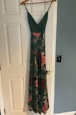 Really wanted to love this dress and it fit really well (size medium) although a little long without platform sandals given my short stature but that was anticipated. Didn't really identify what was "off" about it until I was getting ready to wear it for a wedding. Took the tags off to show my husband and he looked at me a little funny. He pointed out that the chest looked weird without the pattern extending up into that space. After that, I got self-conscious about it as I realized it made my large breasts look even bigger. I didn't end up wearing it for the wedding and now don't know if I ever will, unfortunately. If it had been like the picture on the site, I think I would have fallen in love. - Jennifer M.