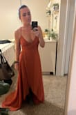 Love this dress! It runs a little large, so I would recommend getting one size smaller (I am not usually an extra small). I also ended up cutting off the extra fabric on the sleeves. The dress is flowy and comfortable and I loved the color. - Sabrina S.