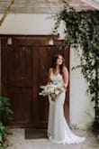 I got this as my exit or reception dress for my wedding. I ended up getting soaked in the rain in my actual wedding dress so I wore this for my whole reception and it was perfect! I was so comfortable to dance in and looks so good in photos! I love the low back and the little train! It still felt like wedding dress even though it was inexpensive! - Hannah R.