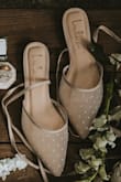 I got these as my wedding shoes and they were perfect! I didn't want heels and you really couldn't see my shoes with my dress but I still wanted special shoes to have as a memory. These looked perfect in my detail shots and worked great for the day! - Hannah R.