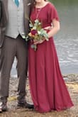 The top fit perfectly and the bottom was a little loose...so I did have to get that taken in just a bit. I loved this dress! The back looked great...and it was just the right height with some heels. - Cecily E.